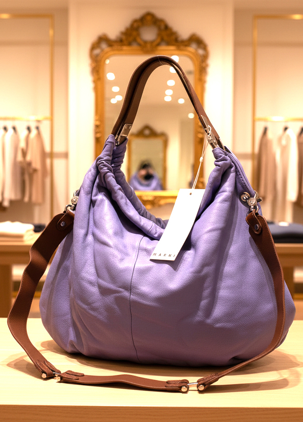 Женская фиолетовая кожаная сумка