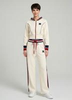 Жіночий білий трикотажний костюм