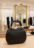 Женская каркасная кожаная сумка